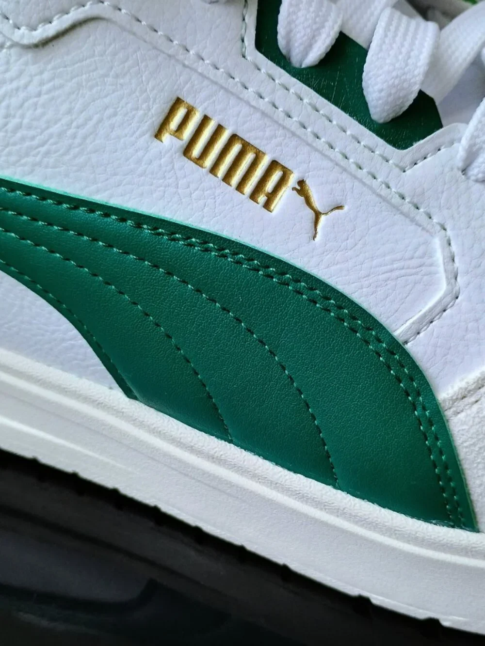 Puma Men's Shuffle Downtown Leather Sneaker in White / Emerald / Ice / Puma Gold